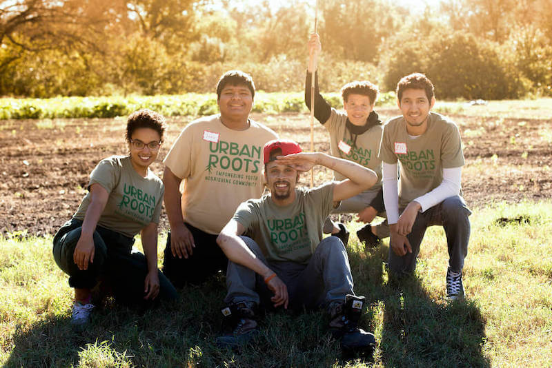 Food & Leadership Fellows (18-23) taking a break from harvesting fresh produce for our hunger relief partners.