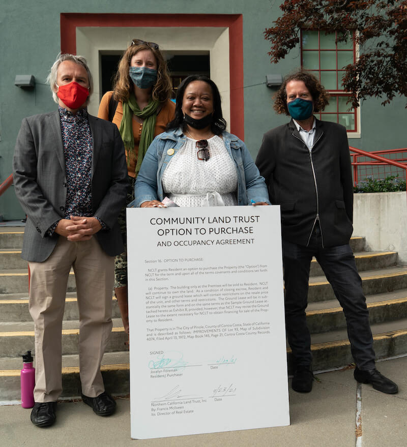 Jocelyn and NCLT staff celebrate the property purchase made via SB 1079. Now her new home will remain permanently affordable.