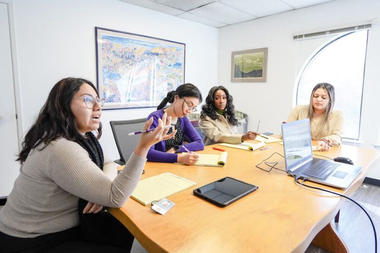 The Midtown Family Services Team takes a holistic approach when assessing a client. Here their credit counselor, attorney, housing specialist, service coordinator, and employment coach are reviewing a client’s self-sufficiency matrix, credit report, criminal record, work-related assessments, and other assessments. They are looking for issues, that if not addressed, will impede the client from achieving self-sufficiency. If any issues are found, they will create a list of specific actions to suggest to their client.