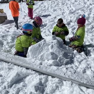 kids playing in snow