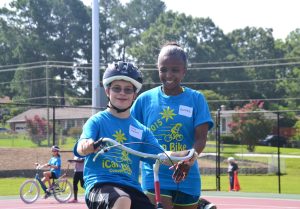 iCan Shine Bike camp participant and volunteer